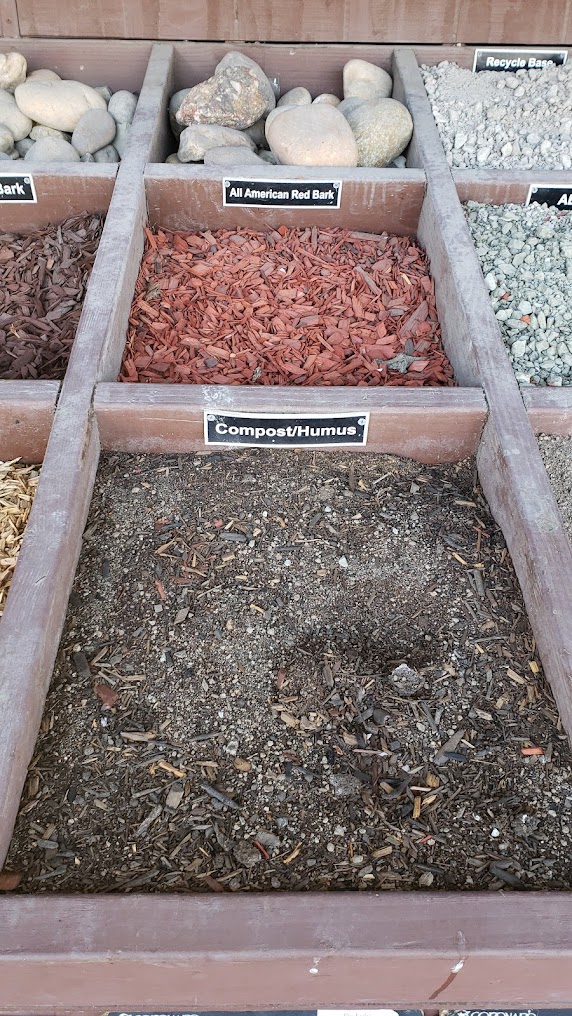 Red bark mulch and compost materials